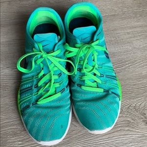 Nike bright blue/bright green running tennis shoes